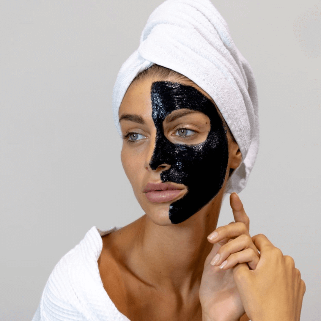 Kit Peeling V Carbon applied on a woman's face, showcasing effective skin treatment with carbon mask.