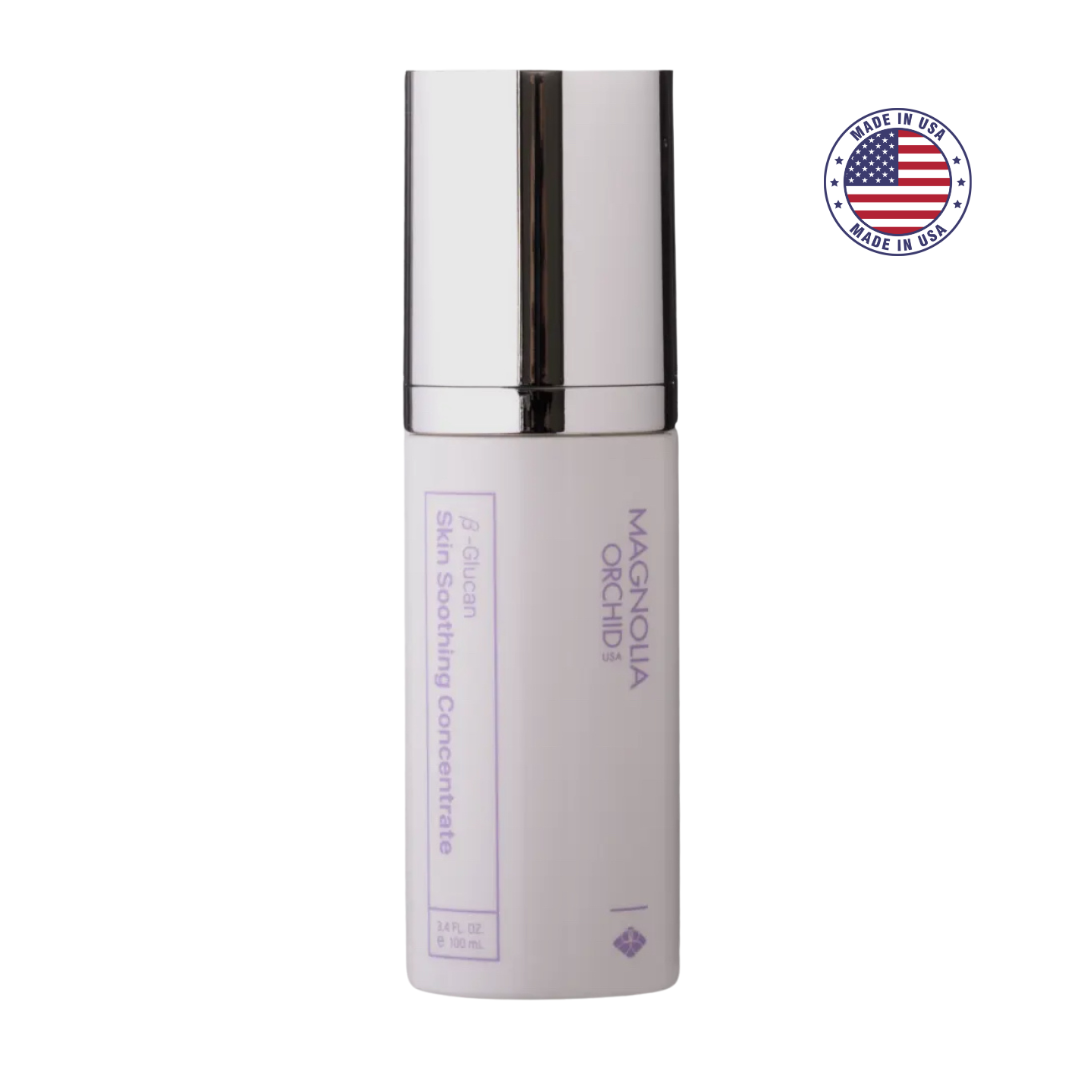 Sérum concentré apaisant au β-glucane Magnolia Orchid (USA) dans un flacon élégant avec pompe argentée. Idéal pour calmer les rougeurs et irritations.
