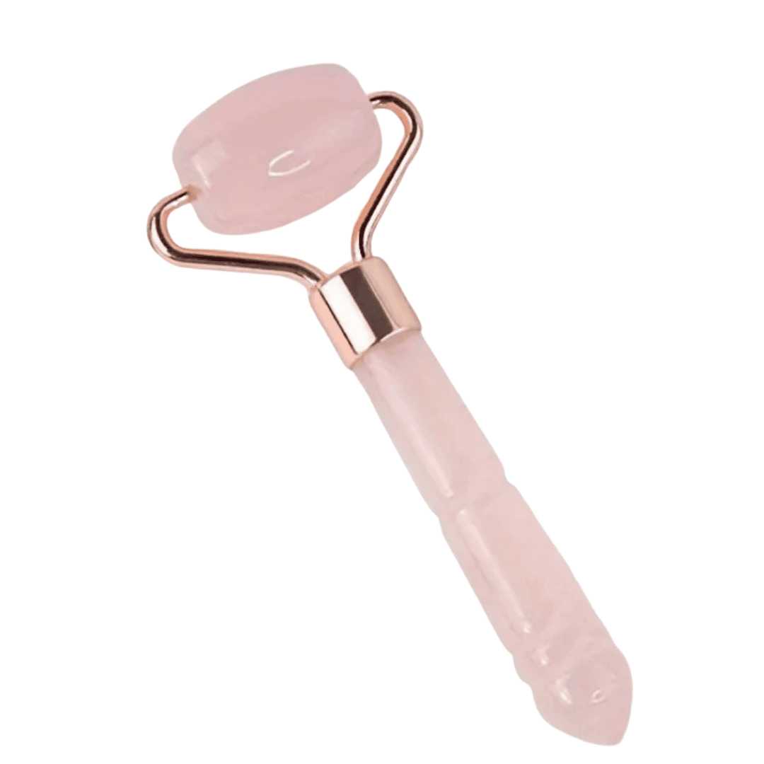 Rouleau de massage en quartz rose du Kit HydraLips, idéal pour stimuler la circulation et améliorer l'absorption des soins.
